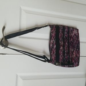 Rare Earth crossbody bag with adjustable strap.